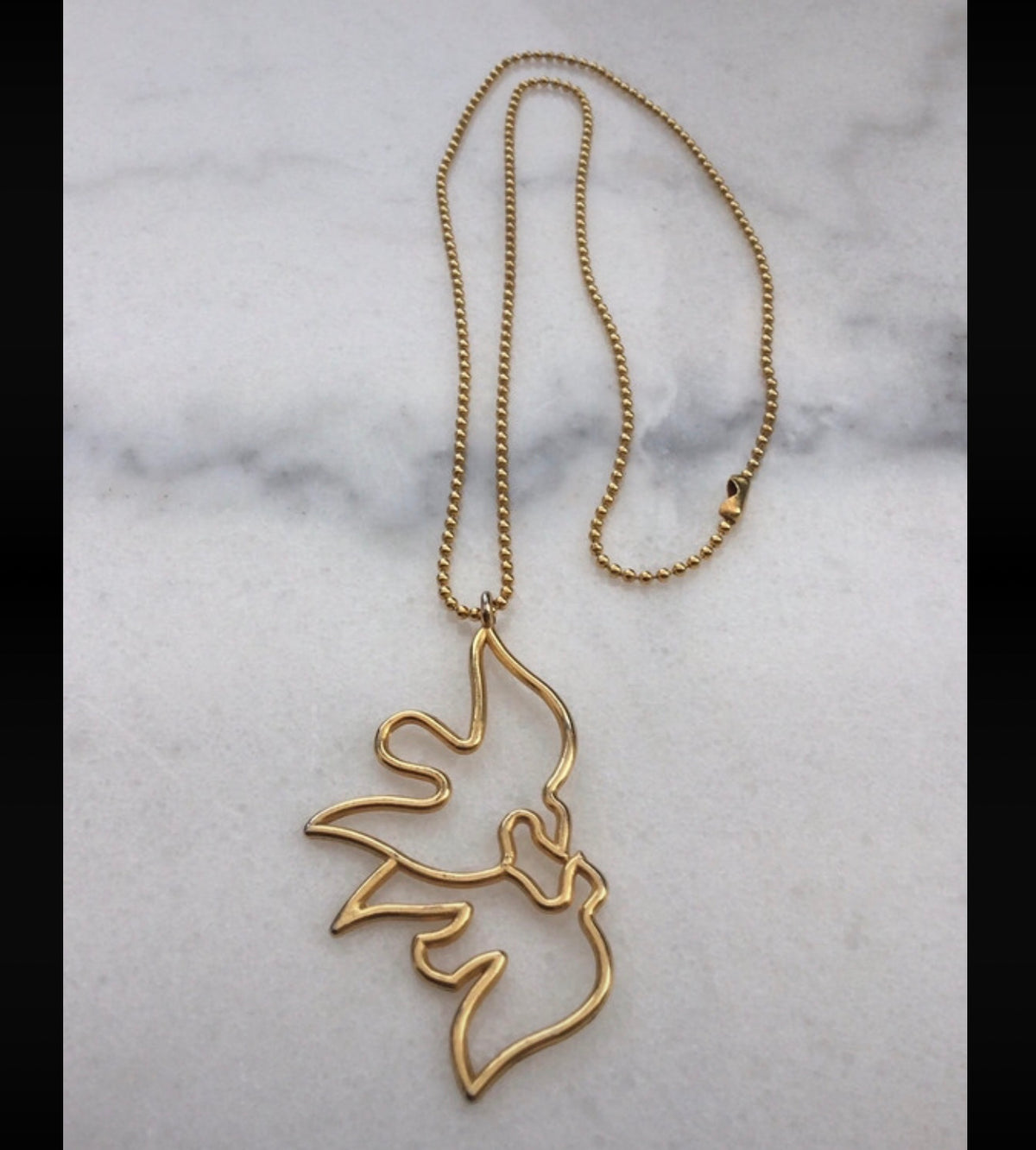 Collier pendentif doré