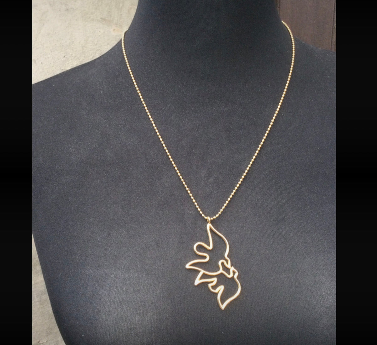 Collier pendentif doré