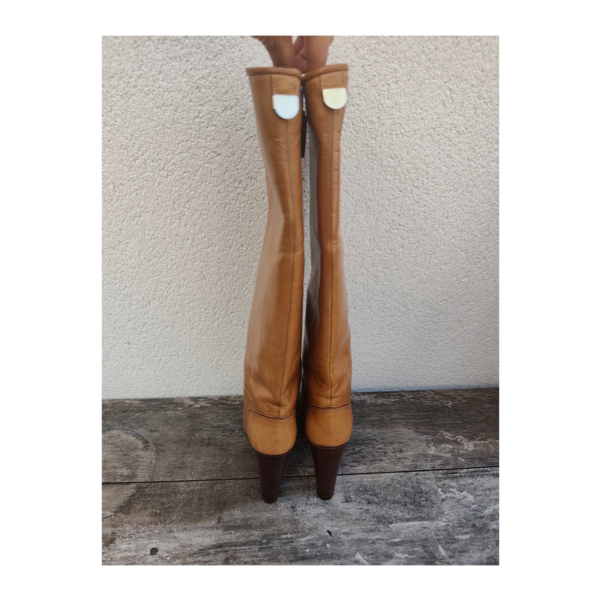 Bottes à talons en cuir