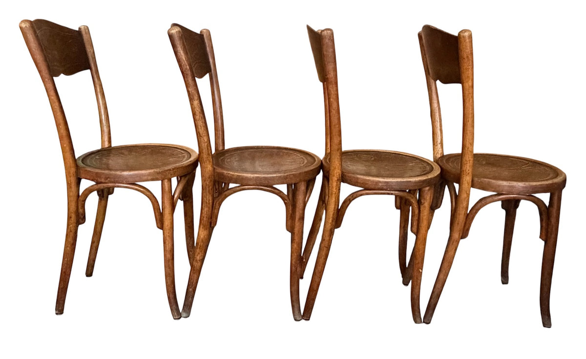 Ensemble de 4 chaises vintage W. Baumann & Cie