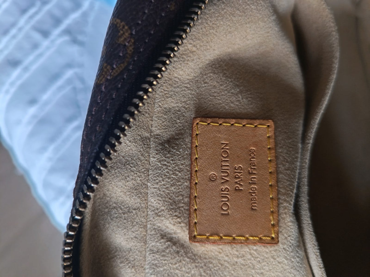 Sac Louis Vuitton Manhattan – Authentique (Certifié Entrupy)