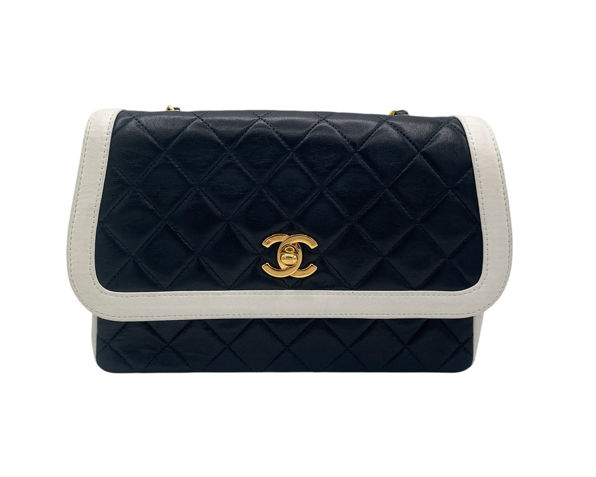 VINTAGE CHANEL BLUE AND WHITE LEATHER